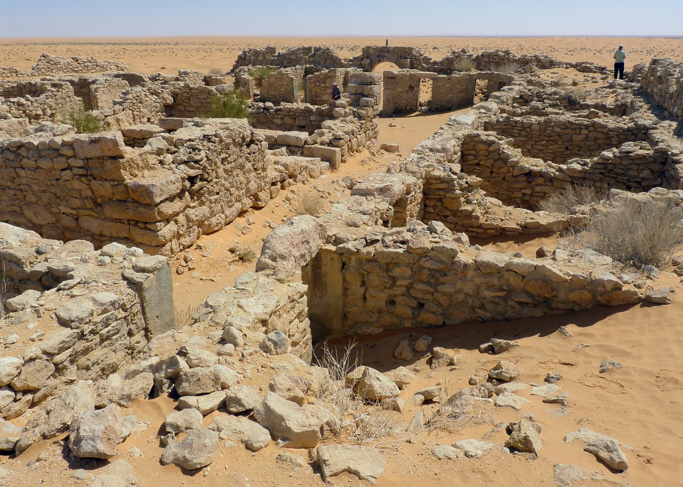 The ruined stone walls of the Roman fort of Tisavar in the sand near Ksar Ghilane